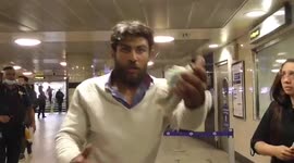 Street beggar screams give my money then throws £200 in cash all over the marble arch station. then rips his jumper off
