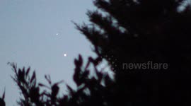 Venus and Jupiter close together in night sky