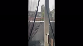 UK man shares video of CRAZY weather with pouring rain in his back garden and sunshine at the front