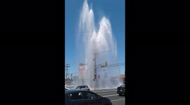 roadside water pump was gushing out water  into the sky after a car crash into the pump