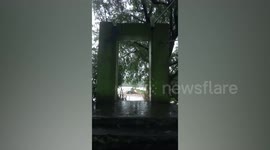 Hanging bridge collapses after being ravaged by flash floods in the Philippines