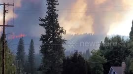 California Dixie Fire burns hillside as residents are evacuated