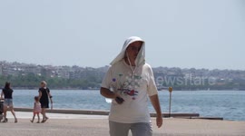 Thousands flee worst Greek heatwave in decades amid wildfires