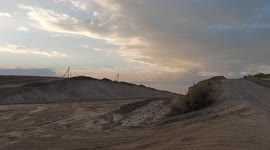 Giant lane is digged through hills and fields to build a highway