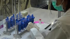 Thai scientists unveil automatic vaccine preparation robot to speed up jabbing by 20%