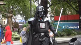 Darth Vader not happy he did get a tip street performer london