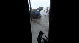 Waterspout comes ashore and destroys small shack in Russian city