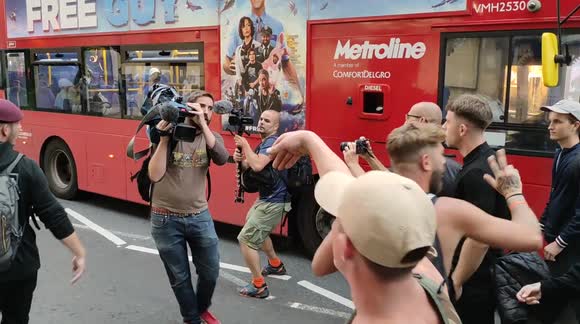 Anti-lockdown activists harass TV crew from Russia Today