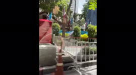 Fully-equipped policemen wait for the 