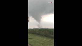 Motorist in awe as colossal tornado rips through building in Illinois, US