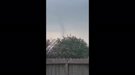 Funnel cloud forms over Houston