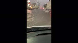 Car ploughs through flooded Kitakyushu road as Japan hit by heavy rain