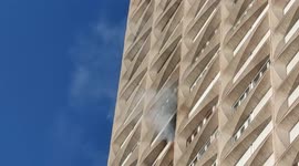Firemen applauded during a Fire in Paris at the Helsinki Tower. Avenue d'Ivry. Inhabitants waiting outside. One dead and four injured. Filmed at 19h. 13aug2021