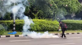 Riot police fire tear gas at anti-government anarchists in Bangkok, Thailand