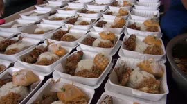 Hundreds of meals prepared daily for people in self-isolation in Medan, Indonesia