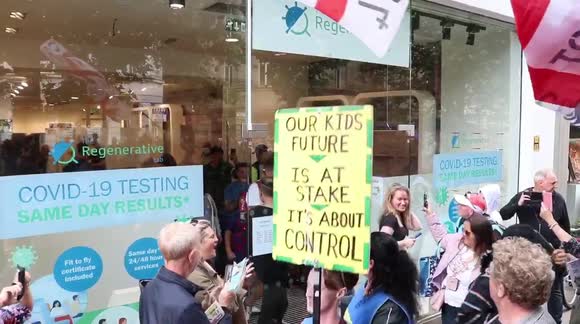 Anti-vaxxers storm Covid test centres during Manchester 'Freedom' rally