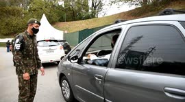 People wait more than 2 hours in line to get the vaccine at a night station in São Paulo, Brazil