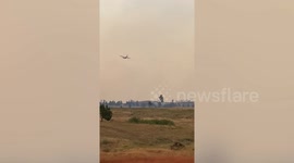 Firefighting planes dump retardant on Richard Spring Fire in Montana