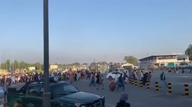 Hundreds of Afghans race to Kabul airport as Taliban takes control