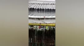 Small lumps of ice rain down on villages in the Philippines during tropical hailstorm