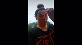 Fluffy white dog ends up covered head to toe in dirt after a fun hike