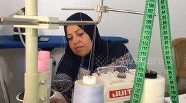 Palestinian women with cancer make garments to support themselves