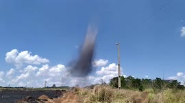 Brazil: Ghostly Dust Devil Swirls Across Burned Field At Canaã Dos Carajás In Pará