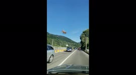 Bee stands still on a driver's windshield at 100 k/h in Romania