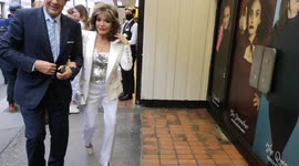Joan Collins and Andrew Lloyd Webber arrive at London Cinderella premier