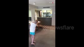 Aussie 10-year-old uses hotel quarantine to nail indoor golf trick shot