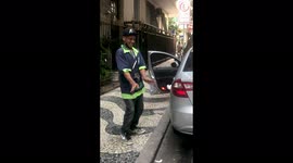 Parking Attendant dancing Brazilian funk in a Rio De Janeiro Street