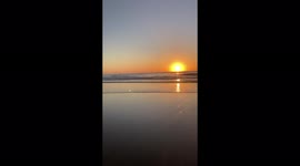 Watch a Stunning Sunrise at Surfers Paradise Beach on Australia's Gold Coast