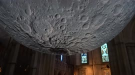 Touch the moon at St John the Baptist Church in Kensington - Luke Jerram's Museum of the Moon