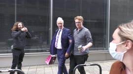 Channel 4 newsreader Jon Snow harangued by anti-vaccine protesters in London