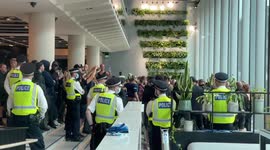 Police remove anti-vaccine protesters who forced their way into ITN buldling