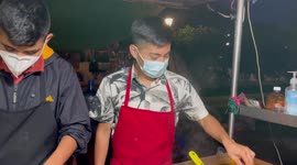 The kids in Guatemala preparing tacos at night for locals during the weekend