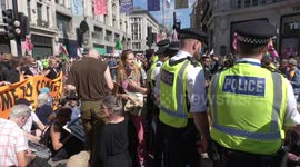 Extinction Rebellion protesters BLOCK Oxford Circus in London on Day 3 of demonstrations