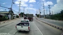 Out-of-control truck crashes through traffic lights in Thailand