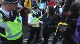 Extinction rebellion arrests obstruction of the highway young girl handcuffed