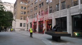 Workers Clean Up The Red Paint Thrown By Extinction Rebellion Protestors At The Guildhall