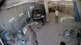 Russian garage staff brutally attacked by man armed with shovel