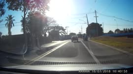 WTF MOMENT: Lorry takes turn too wide and causes traffic accident in oncoming lane (Dashcam Video)