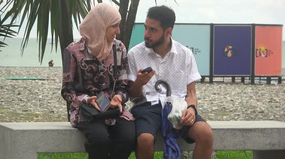 Georgian woman causes street hilarity by dropping condoms and an aubergine