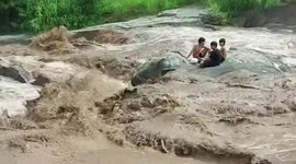 Three youngsters stuck in overflowing river rescued in Thailand