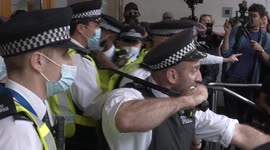 Scuffles as anti vaccine passport protesters try to storm London medical offices