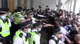 Police and antivax protesters clash outside offices of UK's medicines regulator in London