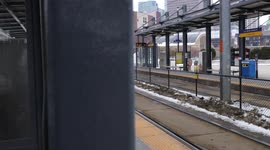Train Arriving At A Station in Minneapolis, Minnesota, Minneapolis metro light rail blue line arrives at US Bank Stadium
