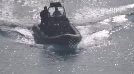 Vigilants rib brings migrants safely into Dover Harbour busy morning in the channel