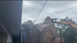 Large boulder falls on house during hairbrained construction work