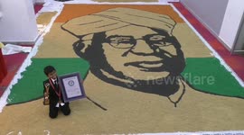 9 year old boy in south India draws a portrait of former president of India with using rice grains to show the plights of the farmers to the world